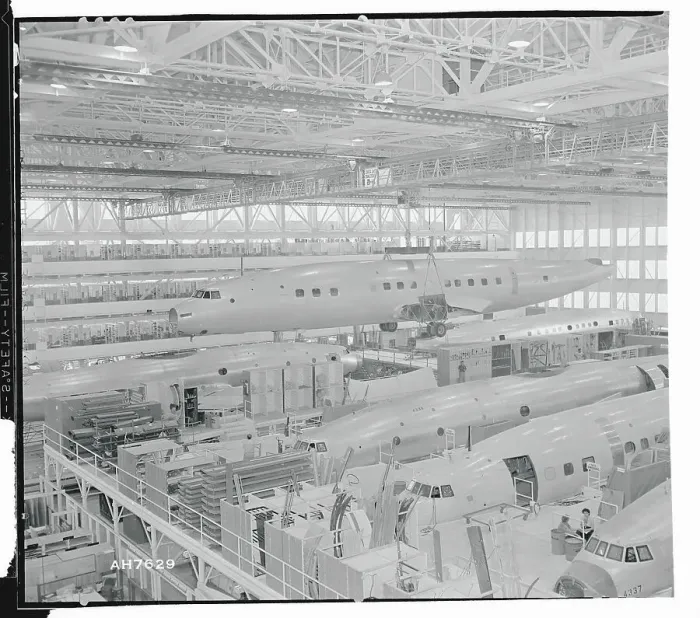 Framed Print : Fuselage Hanging from Crane Framed Print : Fuselage Hanging from Crane