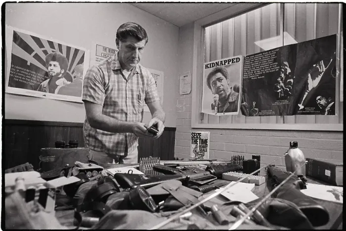 Framed Print : Fuske With Guns & Ammunitions Table