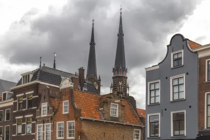 Framed Print : Gabled houses in Delft under a dramatic sky Framed Print : Gabled houses in Delft under a dramatic sky