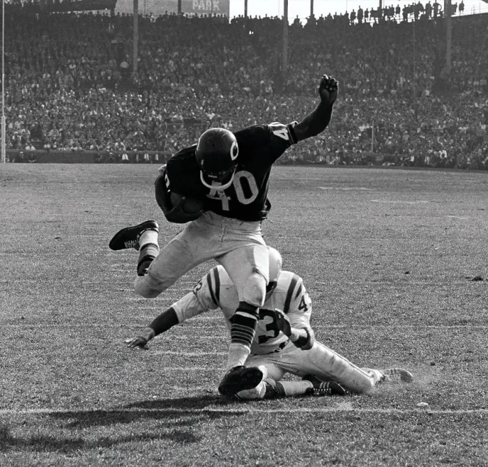 Framed Print : Gale Sayers Eluding Tackle During Football Game Framed Print : Gale Sayers Eluding Tackle During Football Game