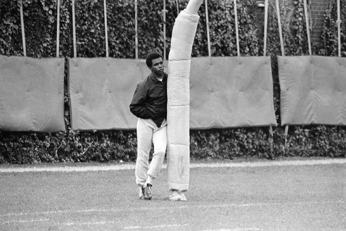 Framed Print : Gale Sayers Leans Against Goal Post on Football Field Framed Print : Gale Sayers Leans Against Goal Post on Football Field