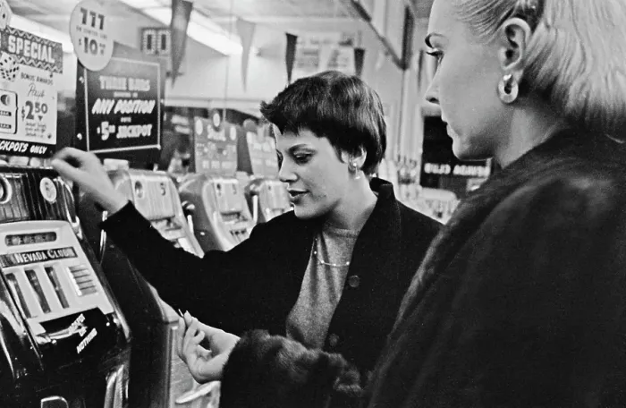 Framed Print : Gamblers Hit The Slots In Las Vegas