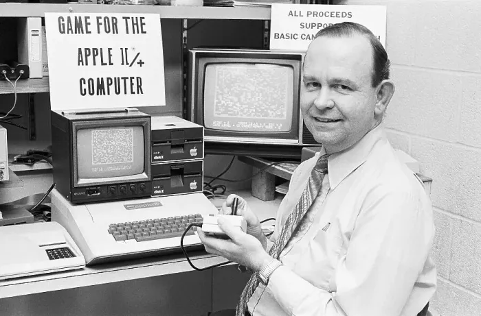 Framed Print : Game Inventor with Apple Computer Framed Print : Game Inventor with Apple Computer