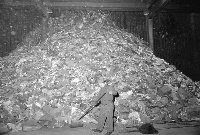 Framed Print : Garbage Collector Sweeping Huge Pile of Trash Framed Print : Garbage Collector Sweeping Huge Pile of Trash