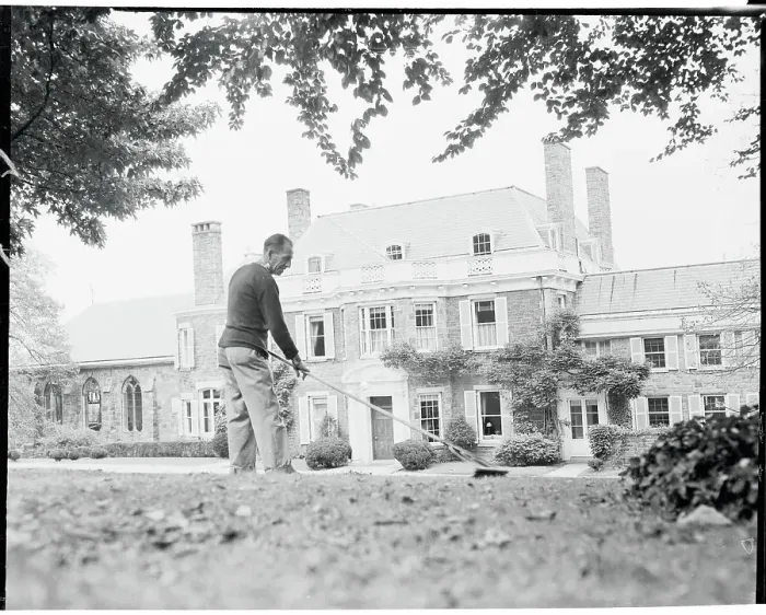Framed Print : Gardener Working in Yard of Riverdale Home Framed Print : Gardener Working in Yard of Riverdale Home