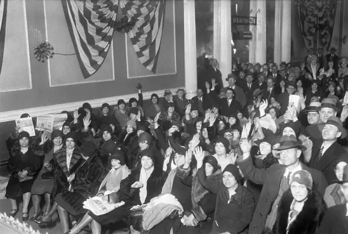 Framed Print : Garment Workers in Meeting with Hands Raised Framed Print : Garment Workers in Meeting with Hands Raised