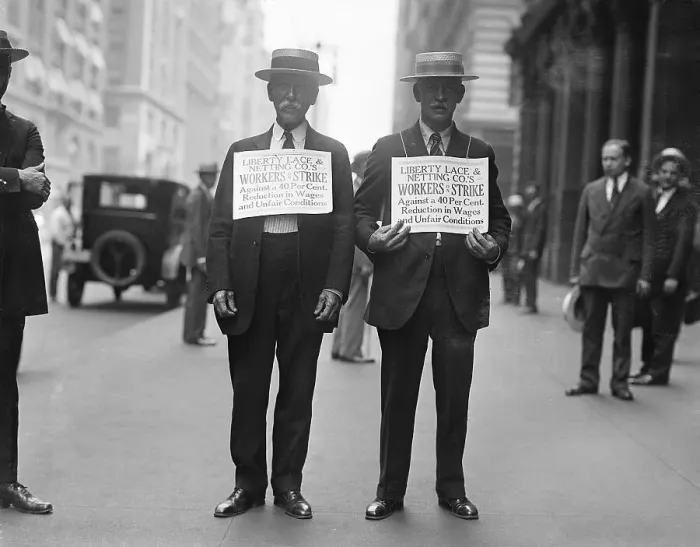 Framed Print : Two Garment Workers Stand with Picket Signs Framed Print : Two Garment Workers Stand with Picket Signs
