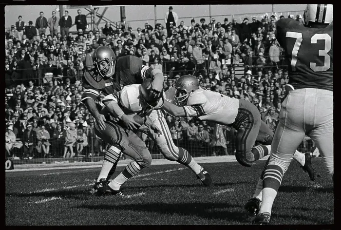 Framed Print : Gary Beban and Kevin Hardy in Football Action