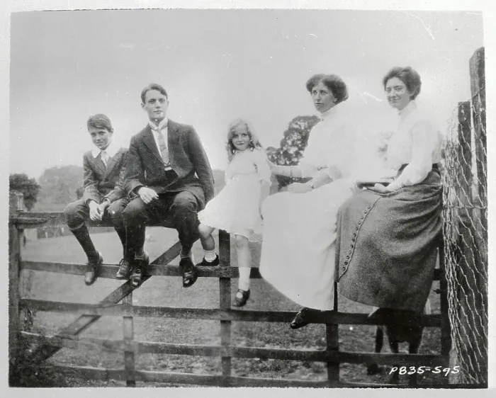 Framed Print : Gary Cooper with Family Sitting on Fence Framed Print : Gary Cooper with Family Sitting on Fence