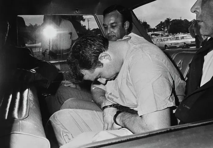 Framed Print : Gary Krist in Handcuffs Looking Down Framed Print : Gary Krist in Handcuffs Looking Down