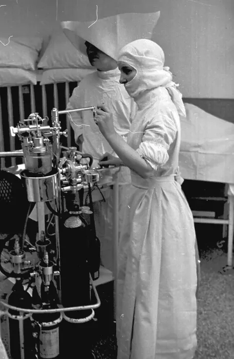 Framed Print : More Gas. 1st October 1938: A nurse regulates the flow of anaesthetic during