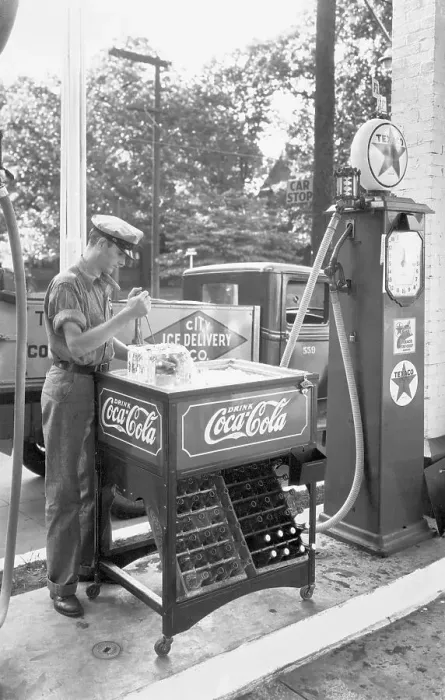 Framed Print : Gas Attendant Chips Ice For Coke Machine Framed Print : Gas Attendant Chips Ice For Coke Machine