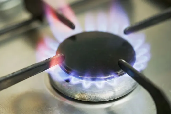 Framed Print : Gas cooker hob, close up of one ring lit up Framed Print : Gas cooker hob, close up of one ring lit up