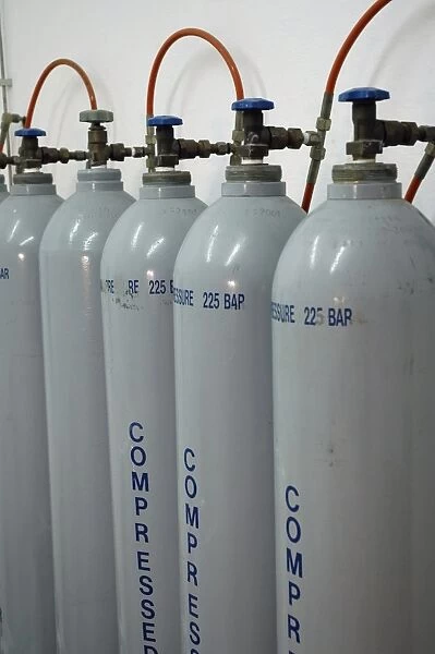 Gas cylinders, compressed air, in a row