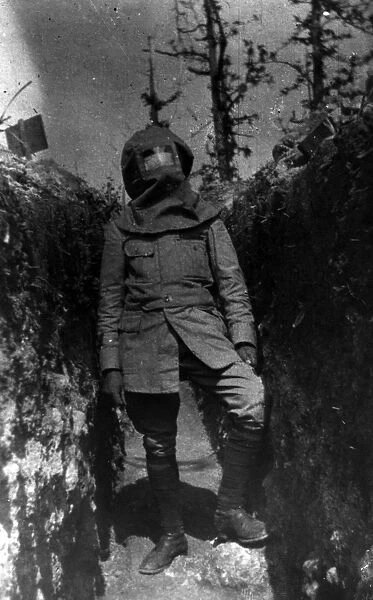 Gas Mask. August 1915: A soldier wearing a gas mask in the trenches during WW1