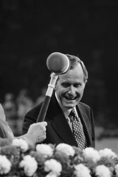 Framed Print : Gavel Appearing to Hit George Bush