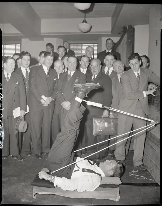 Framed Print : Gene Tunney Demonstrates Pulley Exercise Framed Print : Gene Tunney Demonstrates Pulley Exercise