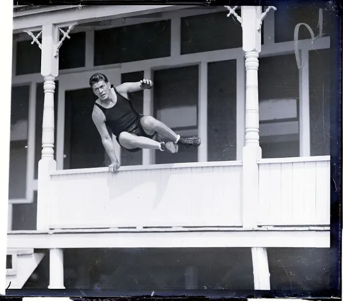 Framed Print : Gene Tunney Leaping Over Porch Wall Framed Print : Gene Tunney Leaping Over Porch Wall