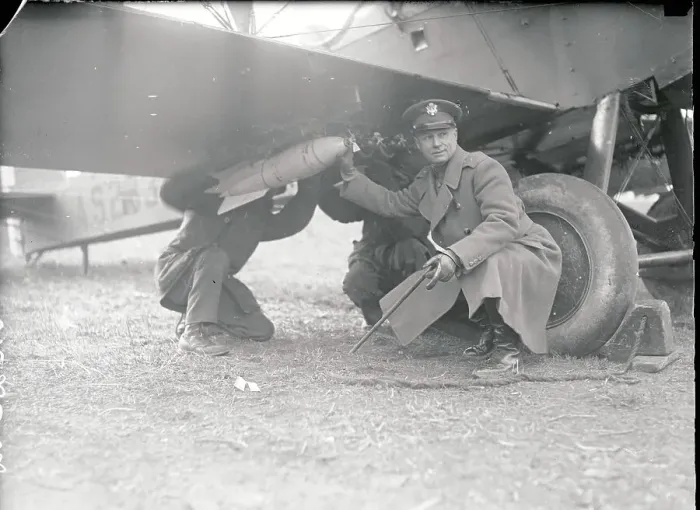 Framed Print : General William E. Mitchell Kneeling Besides Airplane Framed Print : General William E. Mitchell Kneeling Besides Airplane