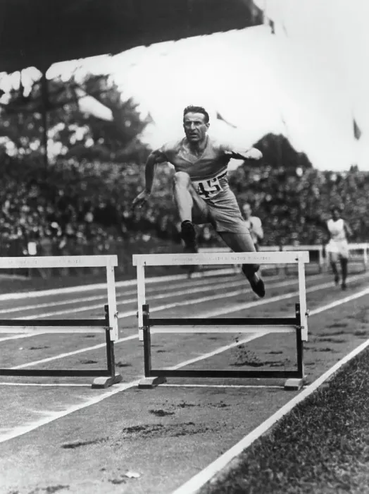 Framed Print : Geo Andre Jumping Hurdles At The Paris Olympics
