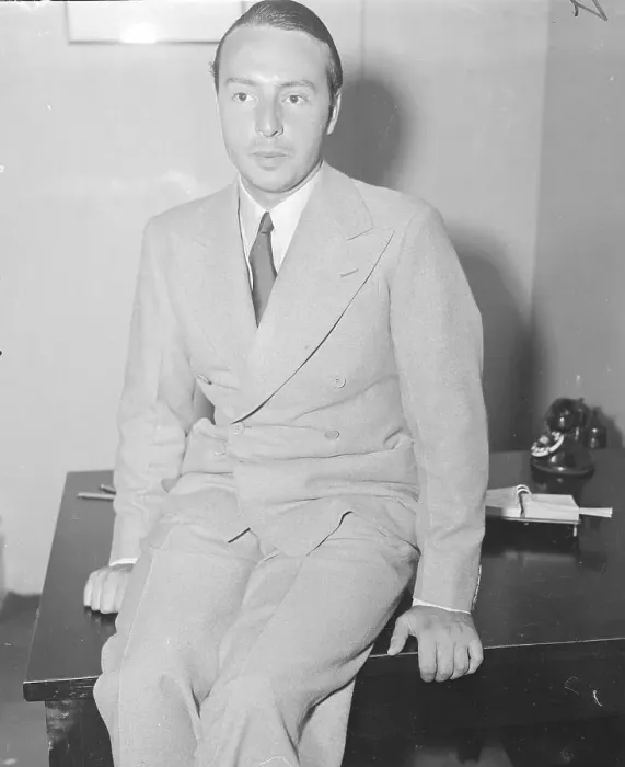 Framed Print : George Balanchine Sitting on a Table Framed Print : George Balanchine Sitting on a Table