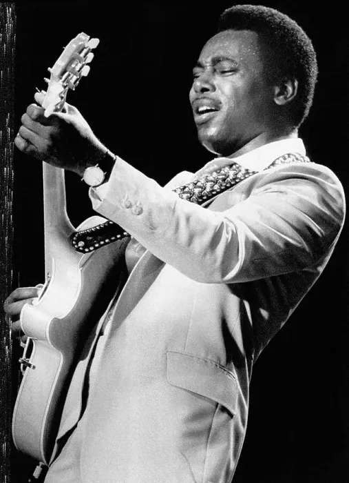Framed Print : George Benson Playing Guitar on Stage Framed Print : George Benson Playing Guitar on Stage