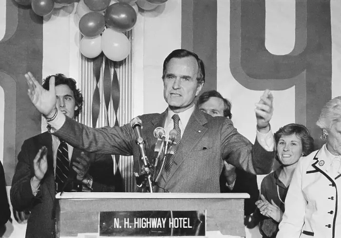 Framed Print : George Bush Gesturing with His Arms Out Framed Print : George Bush Gesturing with His Arms Out