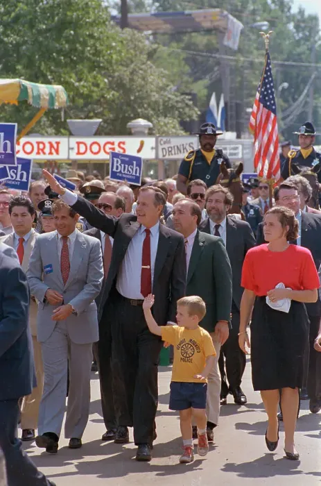 Framed Print : George Bush and Grandson Waving to Spectators Framed Print : George Bush and Grandson Waving to Spectators