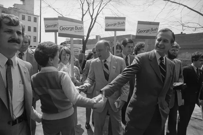 Framed Print : George Bush Shaking Hands with a Well Wisher Framed Print : George Bush Shaking Hands with a Well Wisher