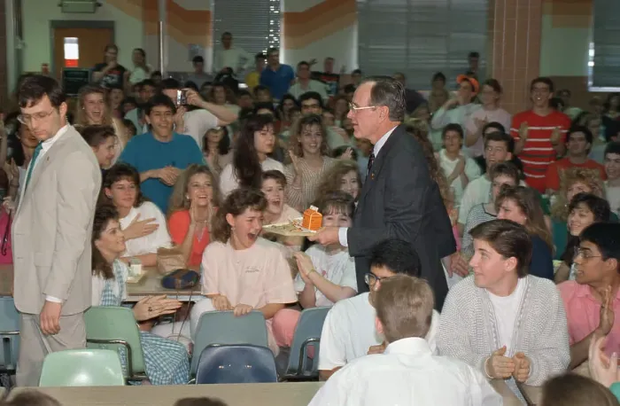 Framed Print : George Bush Sharing Food with Students Framed Print : George Bush Sharing Food with Students