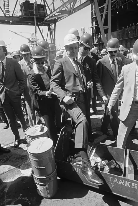 Framed Print : George Bush Stepping over a Container