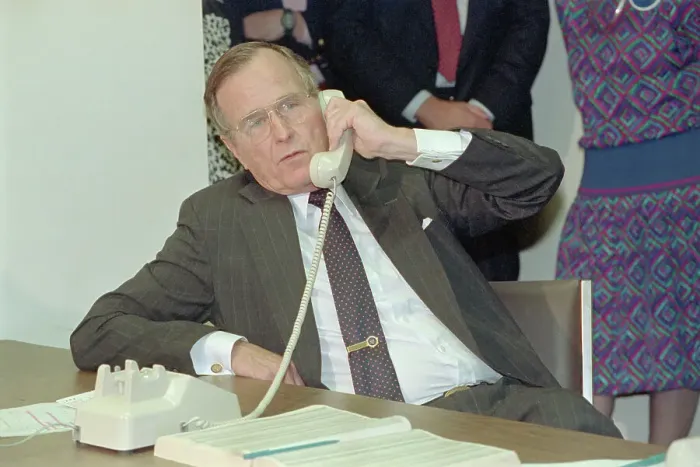 Framed Print : George Bush Talking on Telephone Framed Print : George Bush Talking on Telephone