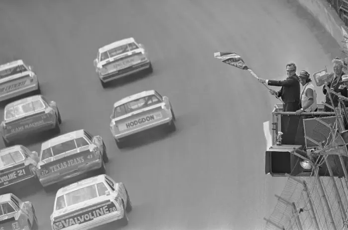 Framed Print : George Bush Waving Green Flag for Start of Auto Race Framed Print : George Bush Waving Green Flag for Start of Auto Race
