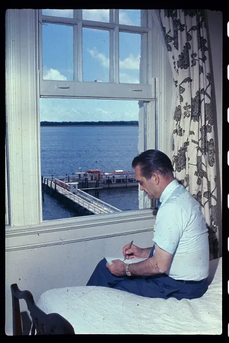 Framed Print : George C. Wallace Sitting on Bed Near Window and Writing Framed Print : George C. Wallace Sitting on Bed Near Window and Writing