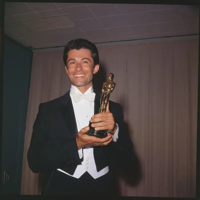 Framed Print : George Chakiris Holding His Oscar Framed Print : George Chakiris Holding His Oscar