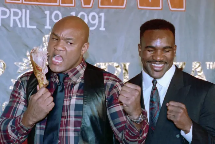 Framed Print : George Foreman and Evander Holyfield at a News Conference Framed Print : George Foreman and Evander Holyfield at a News Conference