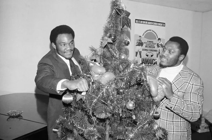 Framed Print : George Foreman and Joe Frazier Around Christmas Tree Framed Print : George Foreman and Joe Frazier Around Christmas Tree