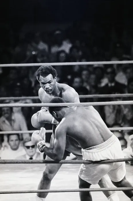 Framed Print : George Foreman Punching Joe Frazier Framed Print : George Foreman Punching Joe Frazier