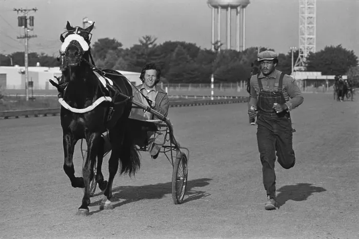 Framed Print : George Foreman Running Alongside Horse Framed Print : George Foreman Running Alongside Horse