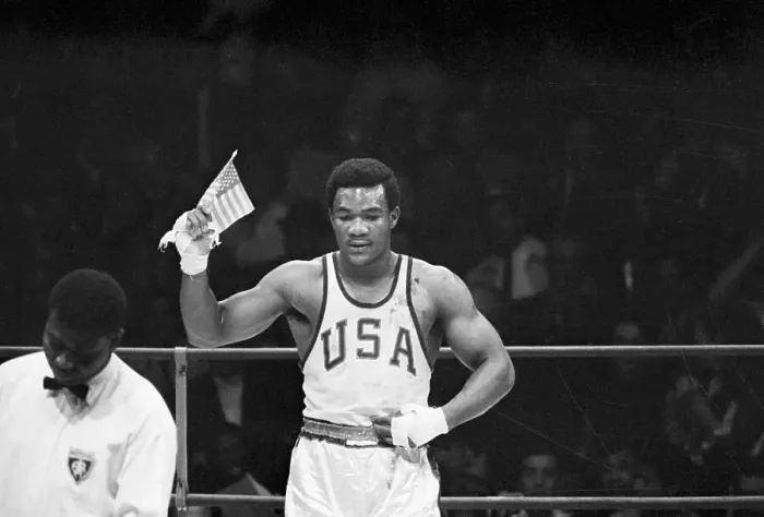 Framed Print : George Foreman Waves US Flag at Olympic Games Framed Print : George Foreman Waves US Flag at Olympic Games
