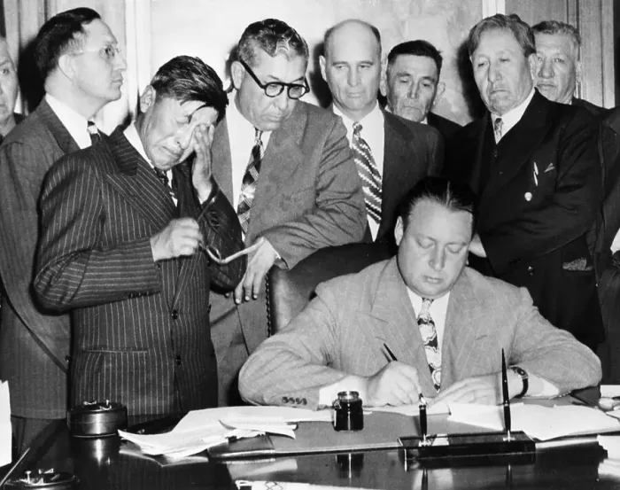 Framed Print : George Gillette Signing a Document Framed Print : George Gillette Signing a Document