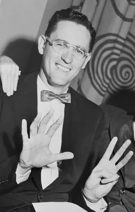 Framed Print : George Mikan Holding Up Eight Fingers Framed Print : George Mikan Holding Up Eight Fingers