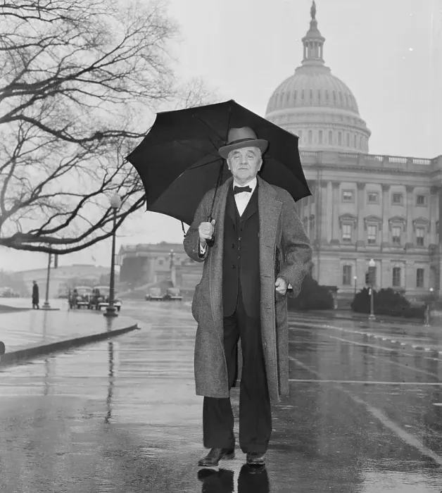 Framed Print : George Norris Walking with Umbrella Framed Print : George Norris Walking with Umbrella