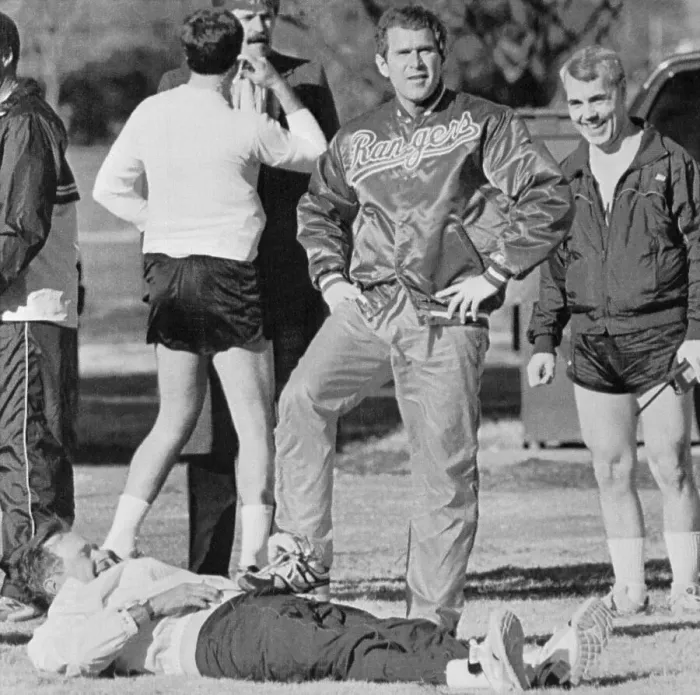 Framed Print : George W. Bush with Foot Resting on President George Bush Framed Print : George W. Bush with Foot Resting on President George Bush