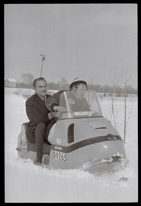Framed Print : George Wallace Riding in Snowmobile Framed Print : George Wallace Riding in Snowmobile