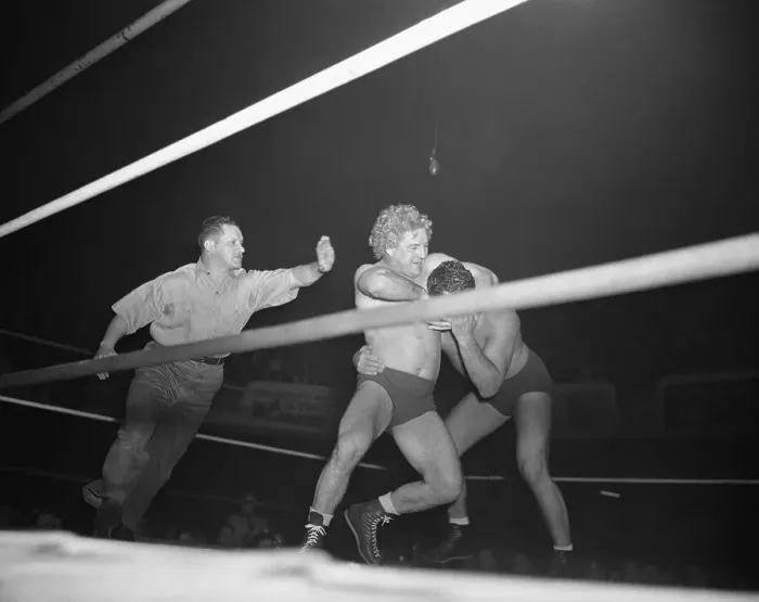 Framed Print : George Wrestling Harshly Framed Print : George Wrestling Harshly