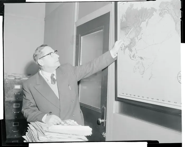 Framed Print : Georgi Okolovich Pointing to a Map Framed Print : Georgi Okolovich Pointing to a Map