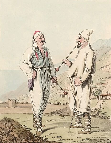 Georgians. circa 1800: An elderly Georgian man draws on his pipe as he