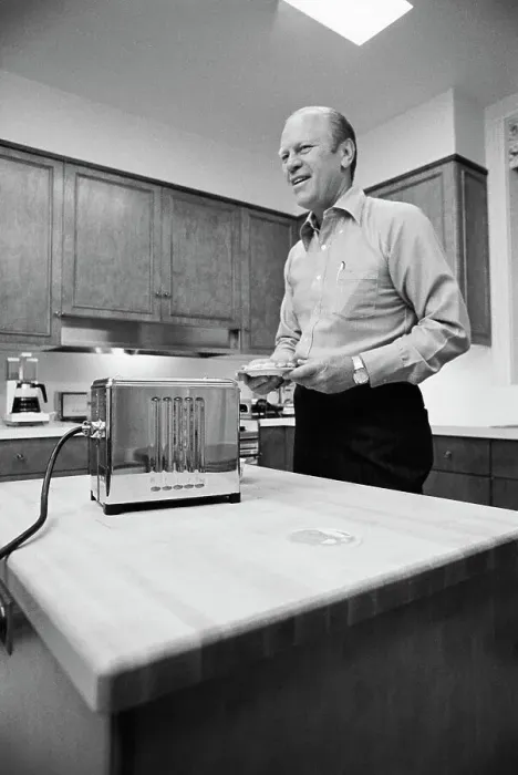 Framed Print : Gerald Ford Carrying English Muffin on Plate Framed Print : Gerald Ford Carrying English Muffin on Plate
