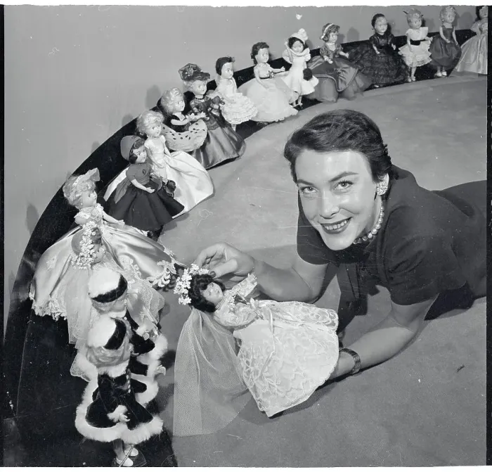 Framed Print : Geraldine Worley Displaying Fashion Dolls